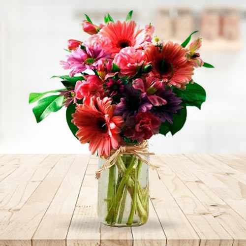 Pinks and Purple Flower in a Mason Jar