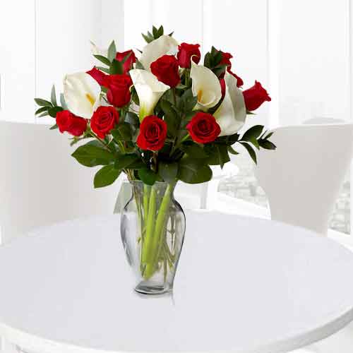 12 red Rose and 5 White Calla Lilies